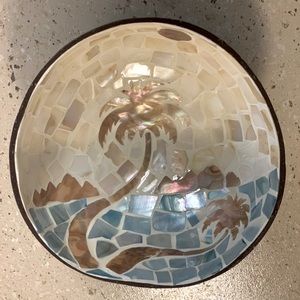 Coconut shell bowl with beach scene
